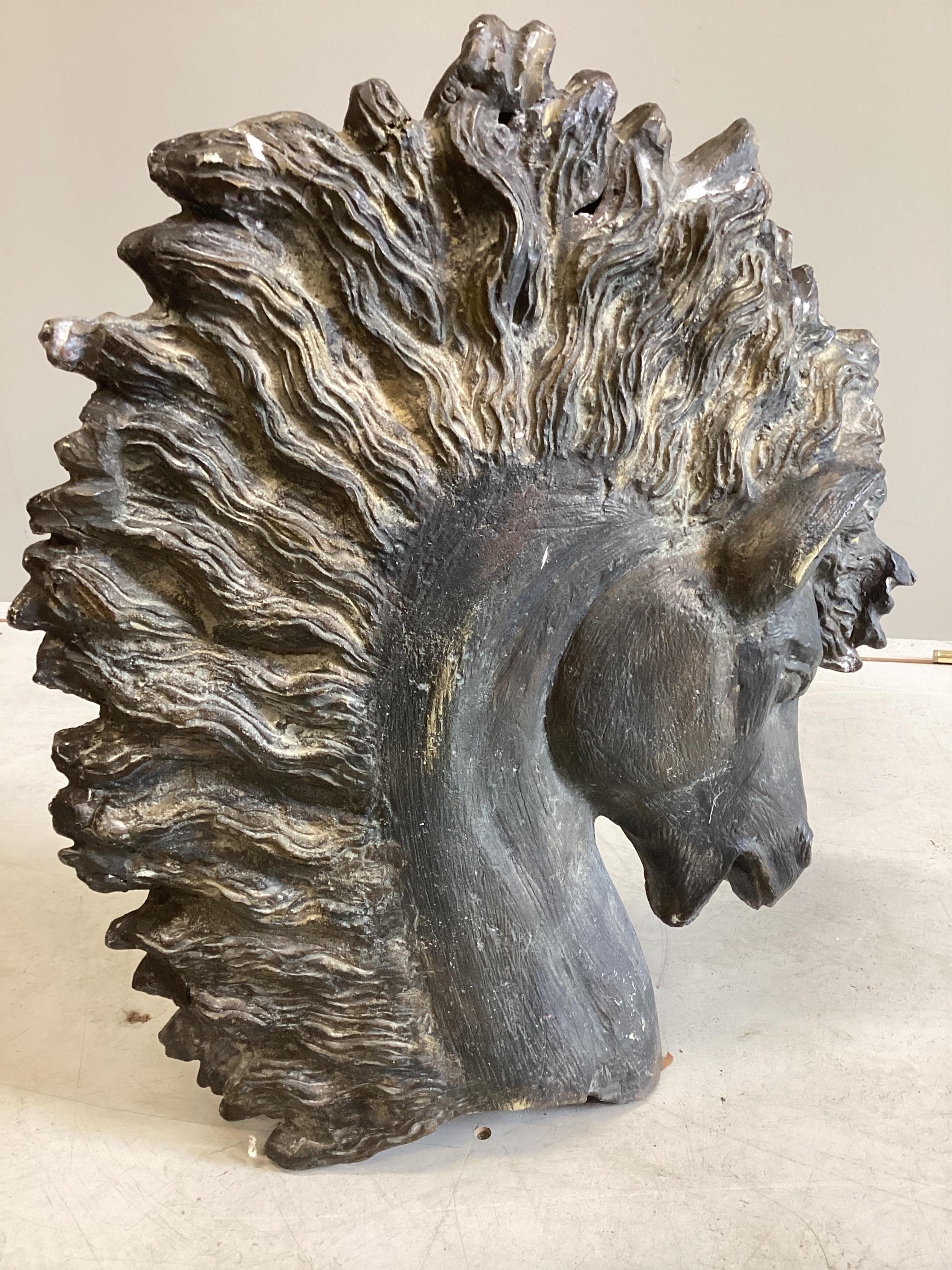 A mid century bronze of a stallion's head, bears gilt signature, width 46cm, height 51cm